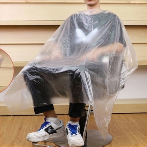 Cape de coiffure jetable à usage unique en PE transparent Casquette de barbier imperméable de style simple pour une utilisation en salon en plastique durable - Product Image 1