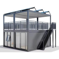 Maison préfabriquée modulaire à ossature en acier à deux étages, alimentée à l'énergie solaire, avec façade en verre, terrasse, design moderne