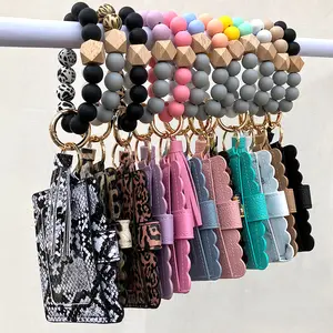 TS New Design Silicone Bead Elastic Bracelet Keychain Card Holder with Leather Tassel Car Keyring Bangle for Women