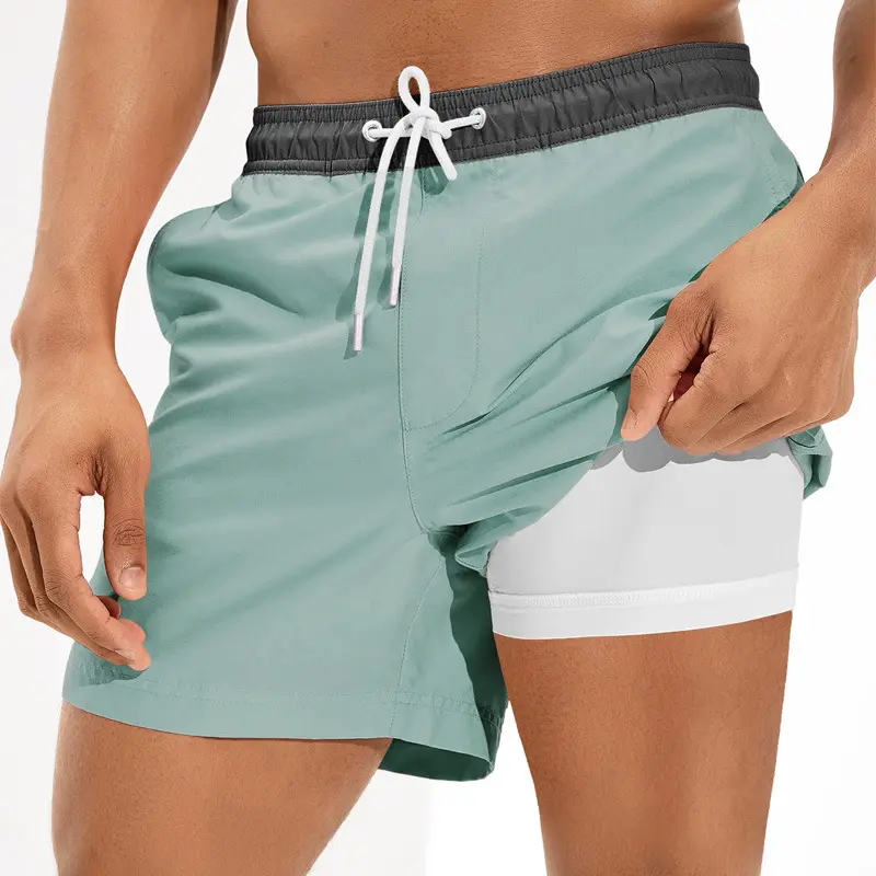 Maillot de bain 2 en 1 à séchage rapide en polyester avec doublure en maille de compression pour hommes short de bain 2 en 1 à logo personnalisé pour enfants