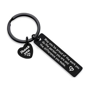 Porte-clés en acier inoxydable noir avec inscription « Que vous soyez fière de votre travail », idéal comme cadeau de retraite - Product Image 6
