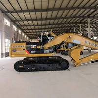 Excavatrice CAT 320D2, poids en ordre de marche de 22 tonnes, godet de terrassement d'une capacité de 0,32 m³, occasion