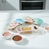 Biscuits en forme de doigt enrobés de chocolat au lait et de crème de fraise, personnalisables en gros (OEM), délicieux, sucrés, en forme de bonbons, en pot.