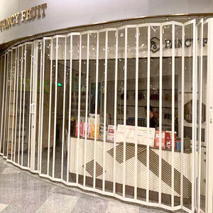 Cerramientos Laterales Plegables para Entrada de Supermercado Comercial Interior, Rejillas Manuales/Motorizadas de Policarbonato Transparente Térmico - Product Image 6