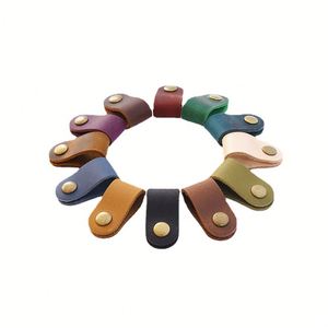Organizador de Cables Práctico, Enrollador de Cables de Cuero con Cierre a Presión, Clip de Almacenamiento para Cordón, Cable de Carga USB - Product Image 1