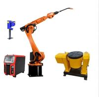 Station de soudage stable KUKA avec bras de robot industriel à 6 axes et portée de 1840 mm, dotée d'un positionneur pour le soudage et le revêtement