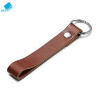 LLavero de piel auténtica clásico de diseño sencillo al por mayor, correa de mano con logotipo personalizado para regalo de promoción, producto artesanal de piel