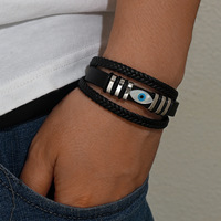 Nouveau bracelet en cuir véritable tressé à double brin avec fermoir magnétique en acier inoxydable de style vintage et breloque œil bleu pour homme