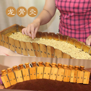 Coussin de moxibustion Dragon Bone en boîte en bois avec laine de moxa pour massage du dos et usage familial - Product Image 1
