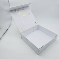 Boîte de rangement pliable haut de gamme en carton recyclé noir avec revêtement UV, fermeture magnétique, personnalisable et écologique pour vêtements