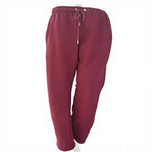 Pantalones de salón acanalados para mujer, color burdeos, de pierna ancha, suaves y elásticos, con etiqueta personalizada, OEM ODM, de forro polar con estampado animal y cintura con cordón. - Product Image 1