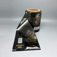 Étiquette rétractable en PVC imprimable de haute qualité et durable, film rétractable thermique pour l'emballage des bouteilles de boissons telles que le café et le thé au lait