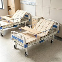 Lit médicalisé portable semi-courbé manuel avec pieds antidérapants et barrières de sécurité amovibles pour soins médicaux temporaires