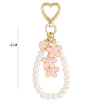 Gantungan Kunci Liontin Bunga Logam Dua Warna dengan Mutiara, Lucu dan Manis, Bentuk Bunga Sakura Kecil, untuk Tas Ponsel dan Headset