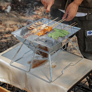 Portable Outdoor Grill 2026 Hot Sale BBQ Grill Stainless Steel Charcoal <strong>Barbecue</strong> for Camping Factory Direct Custom Logo - Product Image 1