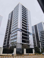 Panneaux en aluminium revêtus de fluorocarbone conçus sur mesure : Exemples de façades extérieures pour grands sites