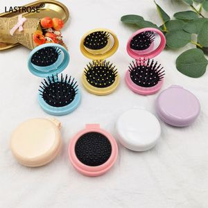 Peigne démêlant massant portable pliable avec finition en alliage de zinc, mini miroir intégré, idéal pour les voyages des enfants - Product Image 2