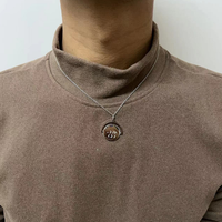Pendentif à illusion optique tournant « Je t'aime » en acier inoxydable. Collier avec inscription tournante, collier spinner