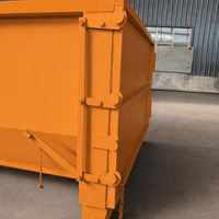 Système de conteneurs à crochets pour le recyclage des métaux ferreux, idéal pour le tri des déchets de construction et des débris de bois, avec options de grande capacité