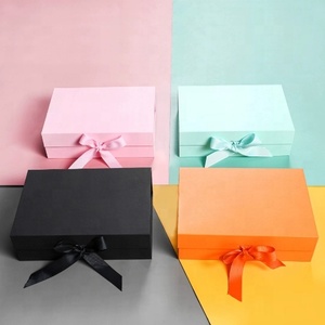 Custom gift packaging paper foldable magnetic gift box with ribbon closure