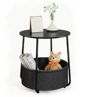 Table basse ronde contemporaine en bois Wayon noire avec panier de rangement amovible en tissu bleu pour salon
