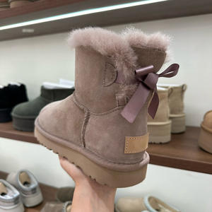 Bottes de neige en cuir <span class=keywords><strong>Uggs</strong></span> tendance 2026 avec nœud papillon pour enfants, filles et femmes – Vente en gros - Product Image 5