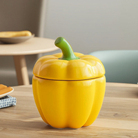 Charmant pot d'étanchéité en céramique de poivre jaune avec logo personnalisé boîte à grains de café, pot à bonbons et bonbons en céramique avec couvercle