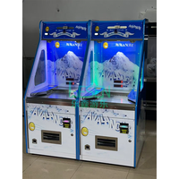 Machine de jeu à jetons de type 'Coin Pusher', équipement d'arcade à monnayeur avec musique et lumières, machine de divertissement avec fonction de lancer de pièces
