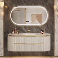 Vente en gros de meuble-lavabo flottant gris foncé à rainures profondes et coins arrondis avec miroir LED ovale et finition dorée pour la maison et l'hôtel