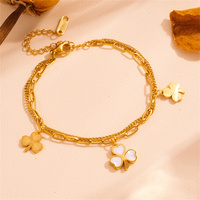 Vente en gros de bijoux pompon double couche bijoux en acier inoxydable trèfle titane acier fleur amour femmes bracelet collier