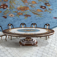 Table à manger ovale de luxe avec incrustation florale de perles, accents dorés, base en bois dur sculpté pour villas de luxe et salles à manger élégantes
