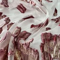 Tissu jacquard en organza à vente chaude avec un design irrégulier et un tissu coloré scintillant doré utilisé pour les robes de soirée ABAYA