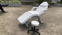 Table de massage électrique réglable pliable en cuir synthétique PVC de luxe au design moderne, pour salon, hôtel, salle de sport