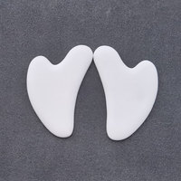 Outil de grattage coréen Produits de massage Anti-rides pour les yeux Vente en gros de massage personnalisé Planche de gua sha blanche Outil de grattage de gua sha en céramique