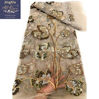 Tissu en tulle brodé de perles et de sequins à motif floral végétal pour robes de soirée