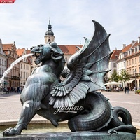 YOUFINE Statue de Griffon en Bronze sur un Livre, Sculpture de Créature Mythique Ailée pour Bibliothèque Universitaire et Campus