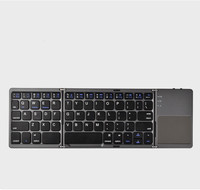 Clavier magique pliable Fteda Mini BT 3.0/5.1 pour téléphone et tablette, pavé tactile, ultra-fin, portable, 61 %, sans fil, rétroéclairage RGB, mécanique, en stock