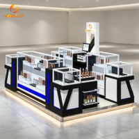 Kiosque de vente de cosmétiques de luxe, présentoir en verre avec éclairage LED, table de présentation de parfums à vendre