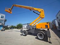 Plateforme de travail aérien mobile articulée sur roues à bras courbé pour la rénovation extérieure des bâtiments