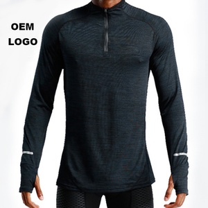 <span class=keywords><strong>เสื้อ</strong></span><span class=keywords><strong>ยืด</strong></span>ออกกำลังกายพิมพ์โลโก้เอง <span class=keywords><strong>เสื้อ</strong></span>ผ้ากีฬาความแข็งแรงสูง <span class=keywords><strong>เสื้อ</strong></span><span class=keywords><strong>ยืด</strong></span>แขนยาวเรียบๆ ไม่มีลาย ซิปครึ่งตัว <span class=keywords><strong>เสื้อ</strong></span><span class=keywords><strong>ยืด</strong></span>ผู้ชายไซส์ใหญ่ - Product Image 1