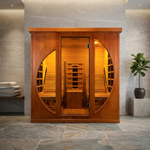 Sauna moderna de madera con puerta de vidrio y ventanas circulares, sistema de calefacción eléctrico de cedro rojo occidental para uso interior. - Product Image 1