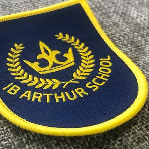 Fashion design school uniform woven badge /garment embroidered fabric badge /high density patch label badge