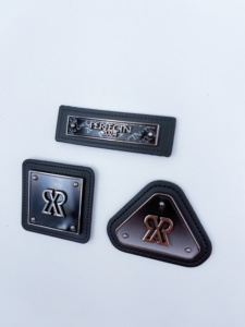Best Selling Gunmetal Color Embossed Clothing <strong>Labels</strong> Sustainable Decorative Logo Patches for Jackets and <strong>Jeans</strong> - Product Image 6