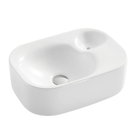 Conception avant-gardiste articles sanitaires blanc Surface lisse évier vasque en céramique évier en forme de roche comptoir salle de bain lavabo pour hôtel