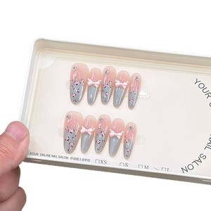 Nuevas uñas postizas francesas largas con diseño de lazo y estampado de leopardo azul, con pequeños diamantes de imitación y efecto ojo de gato, hechas a mano. - Product Image 5