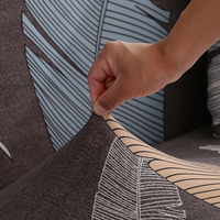Housse de canapé élastique imprimée en forme de L à trois places Jupe magique géométrique pour le salon Coussin lavable