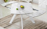 Table à manger ovale extensible avec mécanisme extensible pivotant