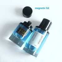 Flacon de parfum vide rond transparent de luxe en verre avec couvercle magnétique, 50 ml, 100 ml, à faible MOQ, avec pulvérisateur à sertir pour une bonne diffusion de brume