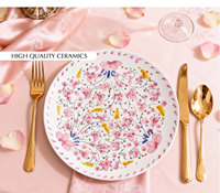 Assiette décorative en céramique de porcelaine fine jaune rose pastoral européenne pour banquets de mariage et fêtes