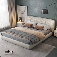 Lit double italien minimaliste de luxe léger en cuir, avec revêtement enveloppant en cuir de vachette première couche et rembourrage souple, avec rangement, pour chambre principale
